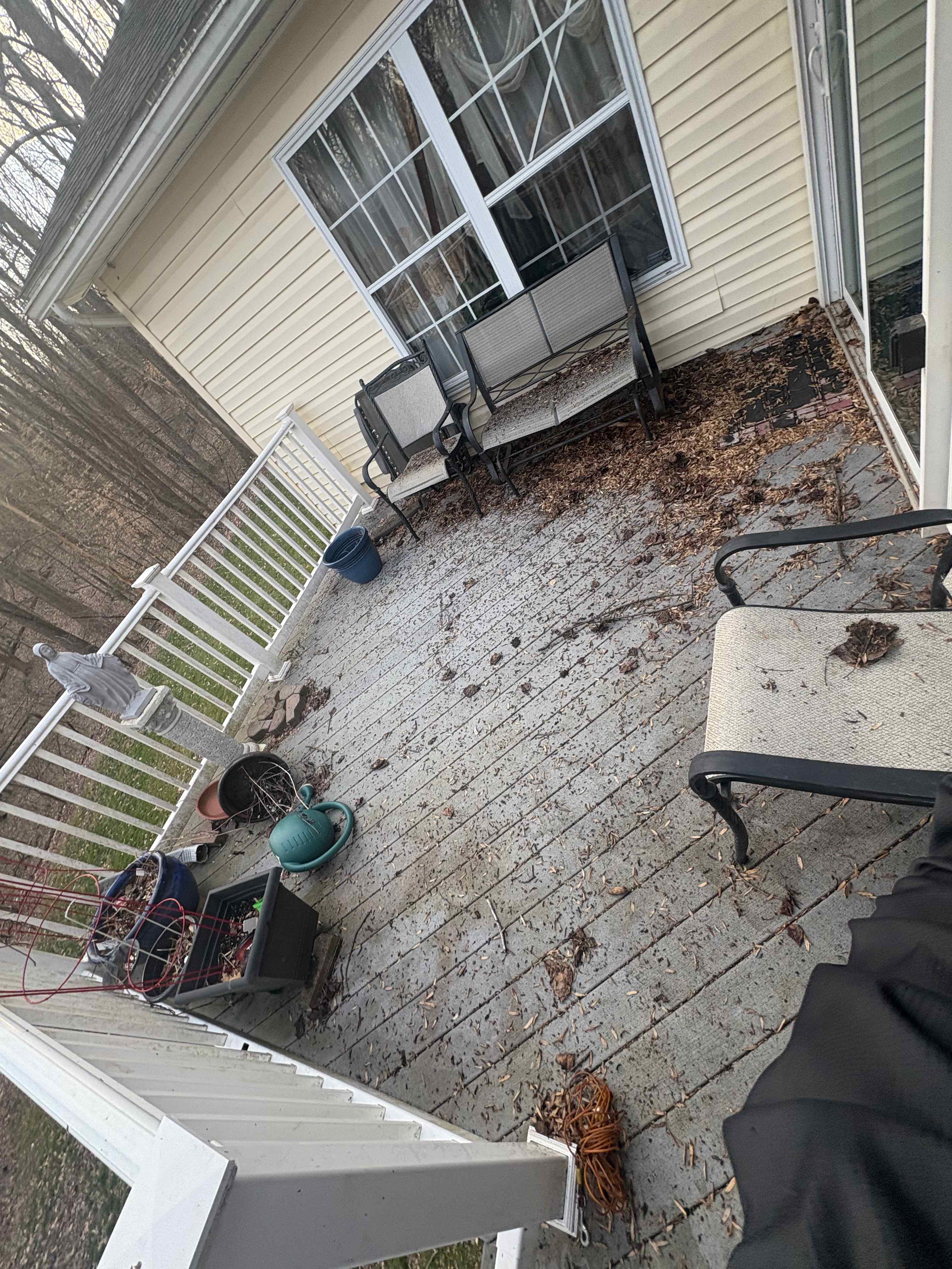 Before: Debris-covered deck pressure washed back to like-new condition